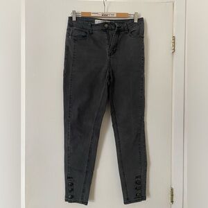 Dark grey skinny jeans with button details
